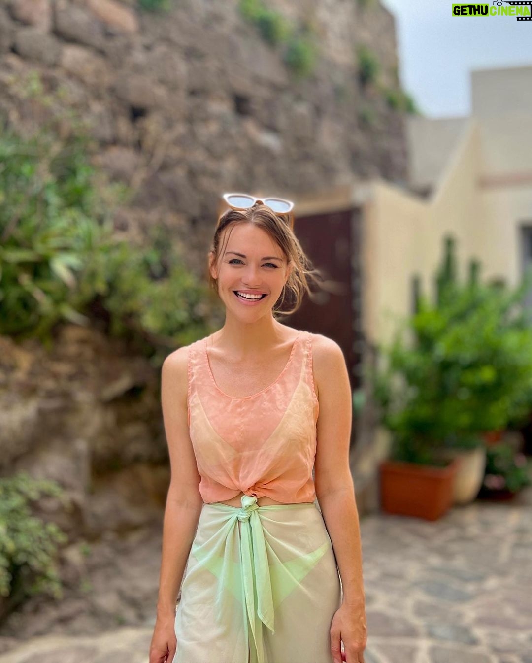 Holland Roden Instagram - Top of Sardinia ❤️ Known for their weaving in Castelsardo. Also get the fish soup but order one day in advance from #pensionepinna (also squid ink pasta!) And their house White Wine Bottle @rohamdp snapping away 📸 (and eating, snorkeling, road tripping, naturally)🌟 it’s the 1st proper vacation I have taken in NINE years 😳 I have always been thankful for the 2/3 day piggy backing I would Mickey Mouse bandage onto work trips. I am grateful to have seen the world at all. But! these few dedicated weeks I will hold dear- never a regret. Climbing into as many crevices as I can in Italy…for now