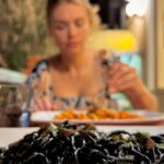 Holland Roden Instagram - Top of Sardinia ❤️ Known for their weaving in Castelsardo. Also get the fish soup but order one day in advance from #pensionepinna (also squid ink pasta!) And their house White Wine Bottle @rohamdp snapping away 📸 (and eating, snorkeling, road tripping, naturally)🌟 it’s the 1st proper vacation I have taken in NINE years 😳 I have always been thankful for the 2/3 day piggy backing I would Mickey Mouse bandage onto work trips. I am grateful to have seen the world at all. But! these few dedicated weeks I will hold dear- never a regret. Climbing into as many crevices as I can in Italy…for now