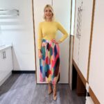 Holly Willoughby Instagram - Morning Monday… bit of a colour injection to start the week on the right note… see you on @thismorning at 10am… #hwstyle💁🏼‍♀️✨ skirt by @essentielantwerp knitwear by @purecollection 🌈