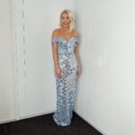 Holly Willoughby Instagram - Sequins at the ready…Today we had the press launch for @dancingonice … It’s happening @schofe!!!!! So lovely to see all the class of 2023… can’t wait for Sunday @itv 6:30 #hwstyle dress by @nedrettaciroglu jewellery by @boodles heals by @renecaovilla ✨💙❄️