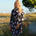 Holly Willoughby Instagram - I love a midi dress, and this satin tea dress is one of my favourites this season! How gorgeous is this print? I’ll be wearing mine with heels for an evening look or boots and a leather jacket for the daytime 🖤 #AD @marksandspencer. ​#MyMarks ​ Dress – T691439