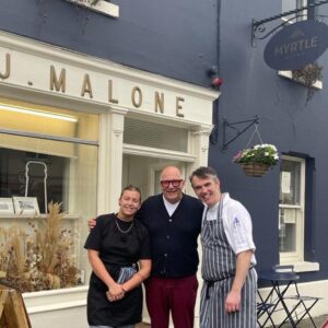 Hugh Wallace Instagram - Myrtle is a fabulous addition to foodie heaven in Ardee. 
The perfect poached eggs,crispy bacon, tea and toast with Jonathan’s delicious green gage jam. 
Photo with Jessica & Jonathon. 
#restaurant #louth #localbusiness #ardee