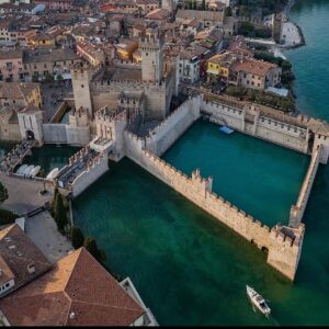 Hugh Wallace Instagram - I am very much enjoying exploring the architecture Sirmione Lake Garda, Italy. 
#architecture #italy #holiday