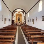 Hugh Wallace Instagram - Today we visited Ermita de Los Dolores, (Our lady of Sorrows) a modest 18th-century church with a rich history. The church has a single nave built in white stonework with black volcanic details. Its façade is crowned by a double gap belfry that serves as a bell tower, with a semi-circular arch across its entrance together with a small translucent oculus. All of this is presided over by a Catholic cross. Its most prominent element is its half-orange dome with a skylight in the centre. When I’m on holidays I love to visit places of interest, any other suggestions? #lanzarote #architecture Lanzarote, Canary Islands