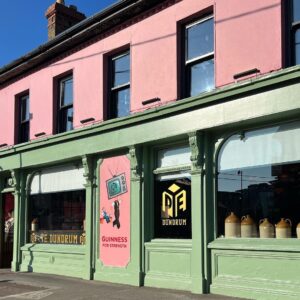 Hugh Wallace Instagram - Walking through Dundrum, I spotted the facade of @pyedundrum illuminated by the sun. 
Great colour scheme & brought back memories of an old Pye TV, when usually the youngest was the remote control! 
#sunnyday☀️ #facade #colour
