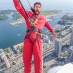 Hunter March Instagram - They asked me to smile in some promo pics for the Edge Walk at @cntower but I just got the photos back and apparently when I thought I was smiling I was actually screaming. My bad. Goofed up big time. I actually had a great time highly recommend it. I’m not crying in the last one. #toronto #cntower #edgewalk