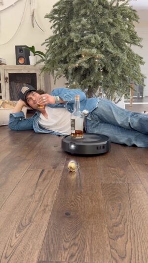 Ian Somerhalder Instagram - Not sure if it’s the rye whiskey or the holiday spirit getting me emotional, but I just can’t let my tree go 🥲 this @irobot vacuum is simply the best. Between Work/ Kids/ Family, It’s  an incredible investment I couldn’t live without ! Plus, it allows me to have my bourbon served right to me which is convenient 💁🏻‍♂️