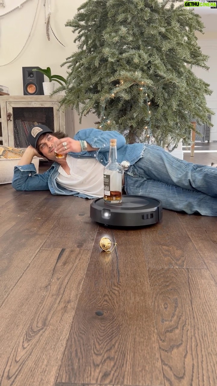 Ian Somerhalder - 1 Million Likes - Not sure if it’s the rye whiskey or the holiday spirit getting me emotional, but I just can’t let my tree go 🥲 this @irobot vacuum is simply the best. Between Work/ Kids/ Family, It’s an incredible investment I couldn’t live without ! Plus, it allows me to have my bourbon served right to me which is convenient 💁🏻♂️