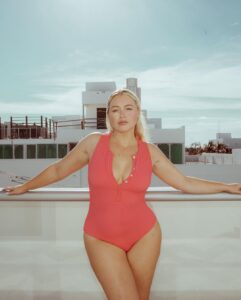 Iskra Lawrence Instagram - Still can’t get over that I got to create my own swim line that’s sustainably made with recycled materials in the most joyous juicy colours… You know I had to make a full YouTube try on haul and run through everything about how and why this swimsuit line with @andieswim is so special to me🫶 Comment below when you’ve watched the try on and let me know your faves🥰 Huge thank you to @midjordan for this amazing shoot✨ . . . #midsizestyle #midsizefashion #midsizegals #miamibeach #modellife #modelshoot #size12 #summervibes #summerstyle #andieswim Miami, Florida