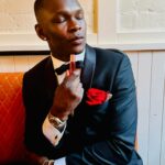 Israel Adesanya Instagram - 🃏 “The Rose that grew from concrete.” - Tupac Shakur 🥀 Did you hear about the rose that grew from a crack in the concrete? Proving nature's law is wrong it learned to walk with out having feet. Funny it seems, but by keeping it's dreams, it learned to breathe fresh air. Long live the rose that grew from concrete when no one else ever cared. @ugomozie ❌ @stylebender 🌹✨
