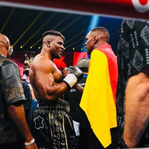 Israel Adesanya Instagram - Inspiration is a powerful force!!
From the sands of the mines to making history through the sands of time ⏳✨. Honored to walk into battle with my brothers. Never above ya, never below ya, always beside ya. #momentsforlife #ThreeKings 👑👑👑
