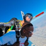 Israel Adesanya Instagram - ☁️🦅🌪️ “In a sky full of people, only some want to fly…isn’t that crazy?!”…Thank you Jason and Debbie at @skydivedubai for an awesome experience. I don’t fear death, I fear not living life to thee absolute fullest, we’re all gonna die someday so push it to the limit!!! You can’t see me…I AM FREE‼️‼️‼️ Dubai, United Arab Emirates