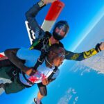Israel Adesanya Instagram - ☁️🦅🌪️ “In a sky full of people, only some want to fly…isn’t that crazy?!”…Thank you Jason and Debbie at @skydivedubai for an awesome experience. I don’t fear death, I fear not living life to thee absolute fullest, we’re all gonna die someday so push it to the limit!!! You can’t see me…I AM FREE‼️‼️‼️ Dubai, United Arab Emirates