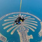 Israel Adesanya Instagram - ☁️🦅🌪️ “In a sky full of people, only some want to fly…isn’t that crazy?!”…Thank you Jason and Debbie at @skydivedubai for an awesome experience. I don’t fear death, I fear not living life to thee absolute fullest, we’re all gonna die someday so push it to the limit!!! You can’t see me…I AM FREE‼️‼️‼️ Dubai, United Arab Emirates