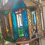 Ivy Winters Instagram - Finished making a stained glass lamp. I used a lot of my scrap glass pieces so I wasn’t sure how it was going to look all put together. I’m very happy the way the colors kaleidoscope into one another as it rotates!It also turns my dining room into a disco at night 😂 #handmade #tiffanystylelamp #leadedglass #lamp #diy #stainedglass #stainedglasslamp #solder #crystal