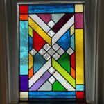 Ivy Winters Instagram - Hello everyone! I hope everyone has been staying happy and healthy this winter season!I’ve been pretty busy making stained glass panels and wanted to share with you my latest commission piece. It’s 31” by 21” with a fun range of colors, textures and square bevels. It has been recently installed in my clients laundry room (last picture). #stainedglass #leadwindow #lead #glass #glasscutter #beveledglass #art #window #handmade