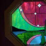 Ivy Winters Instagram - I had a fun time making this northern lights window for my folks house. Each beveled star represents a direct member of our family. So happy how it fit right into the octagon frame as this was my first octagon window! Jamin out to #gilbertosullivan #stainedglass #leadedwindow #forrest #northernlights #antiqueglass