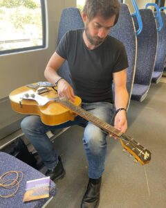 Jack Broadbent Instagram - Changin’ my strings on the train to London. @daddarioandco thanks so much for keeping me rocking. Trying some 11’s tonight instead of my usual 12’s or 13’s. What strings do you guys use out there? Peace, Jack ✌️Catch my last European tour date tonight at the @thejazzcafe Camden Town. Some tickets still available #daddario #guitarstrings #jackbroadbent London, United Kingdom