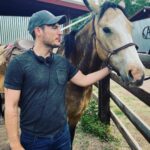 Jake Helgren Instagram - Been since I was a kid on my granny’s ranch in Smithville Texas since I rode a horse…but it’s kinda like riding a bike, only a trillion times better cause what you’re riding is pure magic. 🐴 💫 fell in love with this buck skinned girl Cricket onset—even got to gallop the last day. Pure magic. Scroll => for full riding action + token evil laugh. . . . @ninthhousefilms #ninthhousefilms #directorlife🎬🎥 #comingsoon Rancho San Cayetano