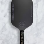 Jamie Foxx Instagram - Dropping The All New (Limited) TBP 16mm Eva Core X - Jamie Foxx Signature Paddle! This sleek design features a 16mm thickness with EVA Core X Technology for optimal performance on the court. The EVA foam core provides a dampened sound that is unlike any other paddle. The unibody carbon fiber edgeless mold provides even more strength to the paddle overall. The all-black design is accented with Jamie Foxx's signature for a touch of style. This paddle probably has the most powerful punch packed into a pickleball paddle that's currently on the market. The larger sweet spot allows for more power and controlled dink accuracy. It ships in an all new black box. *Please not that this paddle is for recreational play only. USAPA sanctioned tournaments currently won't allow this paddle technology due to the powerful deflection. Elevate your game with this top-of-the-line paddle! #pickleball #jamiefoxx