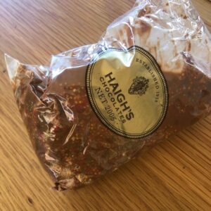 Jane Hall Instagram - A delicious lunch at @elwoodbathers for us… birthday candles for the ex teenager. Also what happens when you leave your beloved @haighschocolates freckles in the car while you’re dining. ☹️.
Happy Christmas to all xxxx