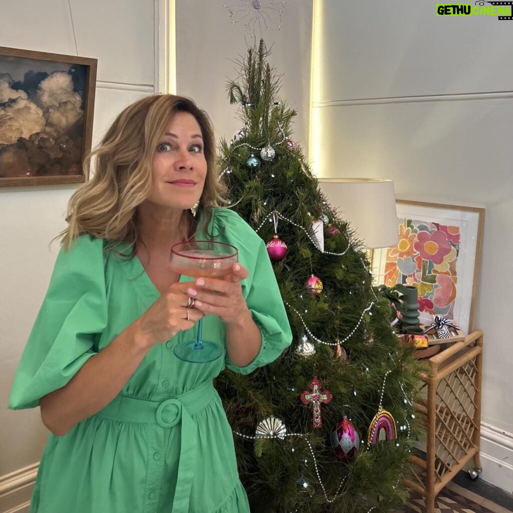 Jane Hall Instagram - First champs of the day. Cheers and happy Christmas to all. Glorious green dress is @cereslife , just fyi xxxxx