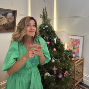 Jane Hall Instagram - First champs of the day.
Cheers and happy Christmas to all. Glorious green dress is @cereslife , just fyi xxxxx