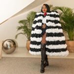 Janelle Monáe Instagram - MIAMI art BASEL. I love you @mickalenethomas thank u 4 making art that speaks to me always & big thank u to @milesisaac. I’ll never forget during my first album cycle you were the first to ask me to perform in Miami where I took a dip in the hotel’s pool mid performance. so happy I got to dip again. ;-) 💦💋 Custom lewk: @fashionbyreyortiz & moi Boots: @stuartweitzman Earrings:@oomiay Glamily: @carlyle.nicole @mandelkorn Mua: moi @miamibeachedition @editionhotels #MiamiBeachEDITION #EDITIONhotels