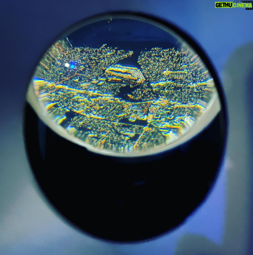 Janet Varney Instagram - The snowglobe effect of LA through the plane’s emergency door window