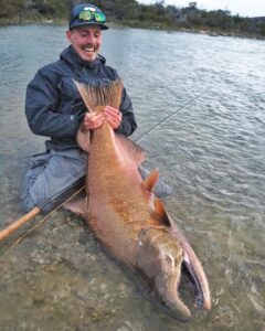 Jasper Pääkkönen Instagram - Glacier King!! Thank you @solidadventures. Quite certainly the biggest salmonid fish I will catch during my lifetime. 85lbs / 38kg of pure madness - look at the size of that adipose fin. This chinook was caught in @estanciacristina in El Calafate, Argentina in the headwaters of Rio Santa Cruz. And then some bad news about the Santa Cruz: the river and its fishery will most likely soon be demolished by a Chinese mega dam & hydro power project. The construction of the dam has already begun - without any significant environmental impact studies on the dam’s effects on nature having been done. The few studies on the dam’s impact on birds and wildlife and questions on it’s impact on the nearby glaciers have simply been brushed off. For a few more years, fishermen will be able to enjoy the free flowing river system and it’s incredible king salmon fishery. What’s mindblowing is that the El Calafate region in Patagonia must be one of the windiest places on the planet. Why destroy free rivers and the beautiful landscape when the same electricity (and more) could be harnessed with wind turbines on the vast high desert of Patagonia? #kingsalmon #flyfishing #glacierking #estanciacristina #elcalafate #patagonia #patagoniaflyfish #visionflyfishing #solidadventures #chinook #superflies #riosantacruzlibre @riosantacruzlibre Patagonia Argentina