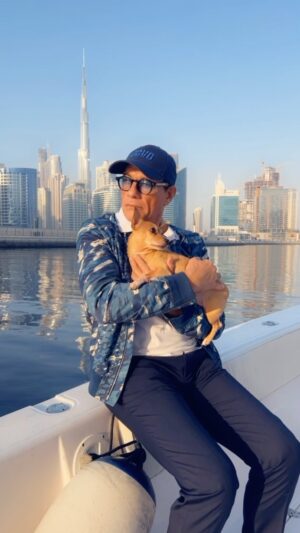 Jean-Claude Van Damme Instagram - Boat trip🛥😎🌊#jcvd #vandamme #dubai #boat  #vacation #dog