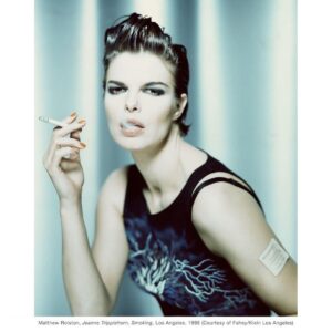 Jeanne Tripplehorn Instagram - Thank you @matthewrolstonstudio. Such a great shoot. Kids - don’t try this at home. Repost from @matthewrolstonstudio “That girl thinks she’s the queen of the neighborhood. I got news for you, she is!” Happy International Women’s Day! Today also happens to be the opening day for @GloriaBellMovie, a new film from Academy Award-winner Sebastián Lelio (@lelioseb) starring @JulianneMoore and the subject of today’s post, @JeanneTripplehorn. Matthew created this smoking-hot portrait of Jeanne in 1998 while Jeanne was promoting her role in the @SundanceOrg film “Monument Ave.” To illustrate Jeanne’s punk rock attitude at the time (who knew?), Matthew had her smoke a cigarette AND wear a nicotine patch on her arm – his little joke. Some people wear their heart on their sleeves. Jeanne wears rebellion on hers lol. You can see Jeanne in “Gloria Bell” now in select theaters. “Rebel girl you are the queen of my world!” #JeanneTripplehorn #GloriaBell #MatthewRolston⁣ .⁣ .⁣ .⁣ .⁣ .⁣ .⁣ .⁣ .⁣ #InternationalWomensDay #IWD2019 #AcademyAward #Oscar #RebelGirl #RiotGrrrl #BikiniKill #SebastianLelio #JulianneMoore #1998 #Sundance #SundanceFilmFestival #MonumentAve #PunkRock #Rebel #Smoking #Nicotine #Patch #BlackShirt #Rebellion