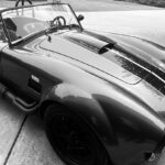 Jeffrey Dean Morgan Instagram - Man… my mistress here. Just can’t NOT smile driving her! Kids as obsessed as I am. I’ve wanted a cobra my entire life. Had a photo of one on wall of childhood bedroom. Now? Well? I walk out to garage and stare. Nothing more fun on these Georgia backroads. @backdraft_racing makes one hell of a vehicle. @earthmotorcars and @trevor.i.lewis thank you guys for putting this all together for me. It was a long haul, but so worth it! Can’t tell you how much I appreciated the time, or how much we love this car! Even @hilarieburton can’t hide her smile! (It kills her to like it!) also… thanks for the kicks @fkc_mooneyes_spain!! Y’all have a great week. I’m gonna go drive. Xojd