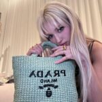 Jeon So-mi Instagram – Summer #seaBeyong with prada🧚🏻‍♀️
This recycled bag is meant for non-biodegradable waste💦