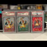 Jeremy Padawer Instagram – A complete set of 1996 Carddass Charizard PSA 10.  Maybe less than 5 complete sets in existence? 

#000 PSA 10 Charizard Trainer (pop 10)
#6 PSA 10 Charizard Prism Red (pop 50ish)
#6 PSA 10 Charizard Prism Green (pop 30ish)

The red and green are together in the pop report (87 total). 

Some believe Carddass is the first set.  I believe it very likely hit the street first. 

I’ve never received the complete story on Carddass vs Topsun.  My belief is that the Topsun license might have been first signed.  Style guide appears to be the oldest based on many conversations I’ve had.  Art and dating.  However, Carddass appears to be distributed first – first in consumer hands.  The question of printing will never be known.  If Topsun was licensed, printed and held in a warehouse – explaining the 1995 mark – will remain a mystery.  How 1995 mark was ever reviewed and approved in such a comprehensive system will remain a mystery. 

Carddass appears to have the best clear claim to 1st in consumers hands.  And, over time, that makes the 3 Carddass cards in the set Green Prism, Red Prism and 000 Trainer very rare and worthwhile in Pokémon history… and without further information, they may be the true rookie cards.

The most comprehensive review and tracking of this set is done by @maxmaxcity – a seriously committed and passionate collector.

Some opinion above!! ❤️❤️
Jeremy