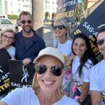 Jeri Ryan Instagram - Love the solidarity on the WB picket line with this glorious @sagaftra family! ✊🏼 Keep coming out and SHOWING UP — EVERY DAY until we get the deal we need and deserve! We didn’t come this far to only come this far. Stand strong. They need us. One day longer. One day stronger. As long as it takes. ✊🏼 #sagaftrastrong #sagaftrastrike #power2performers