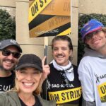 Jeri Ryan Instagram – Another great turnout on the picket line — and my awesome son, Alex, joined me today! ❤️ Huge thank you to our @iatse family for showing up BIG! ✊🏼✊🏼✊🏼
Let’s KEEP SHOWING UP and keep FLOODING these lines EVERY DAY until we get the deal we deserve! And remember, this is a marathon, not a sprint. A deal isn’t gonna be made in a day or probably even a week — there are MANY deal points that need to be hammered out and agreed to, and it takes time and patience. So let’s all be patient too and send our NegCom ALL the love and support and positive energy!!
One day longer. One day stronger.
As long as it takes. ✊🏼 @sagaftra #sagaftrastrong #sagaftrastrike #power2performers #unionstrong #1u