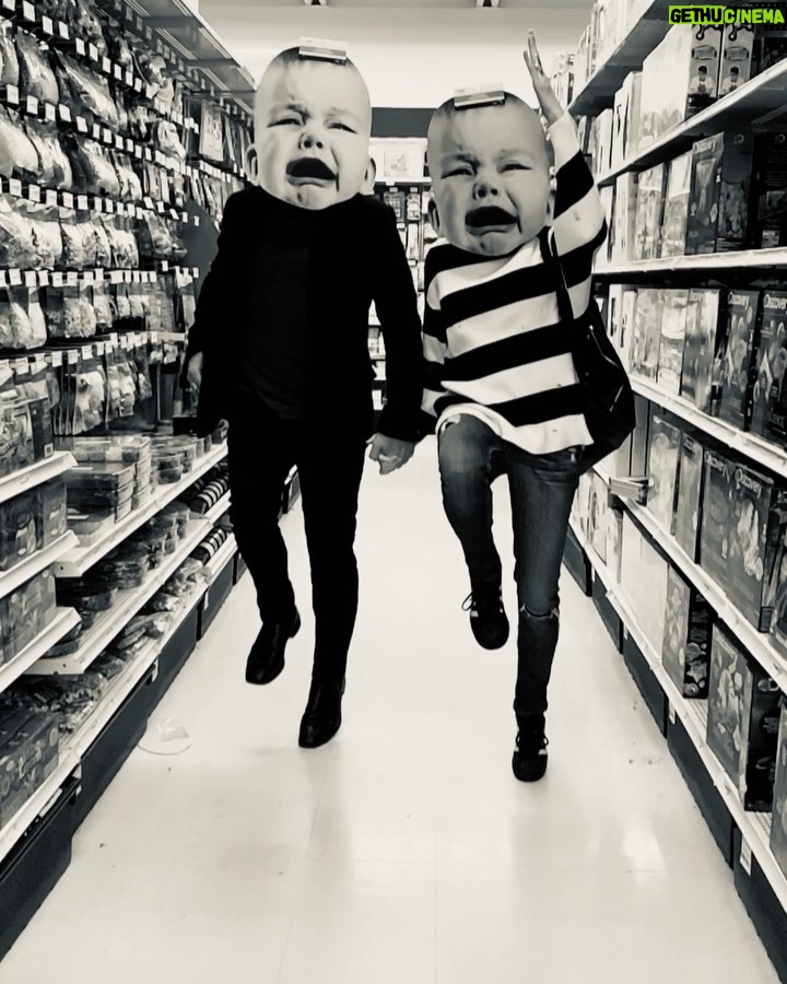 Jes Macallan Instagram - This is what happens when the kids want to go to Toys R Us... but you realize you and your love are actually kids at heart too 🤪 I call this short film “a conflict of emotions”. With @mrnicbishop, cam op Ava Lily 😂🤣 #toysrus #shenanigans #happyhalloween #stanleykubrick #youcanttakeusanywhere #blackandwhite #funnyorterrifying Vancouver, British Columbia