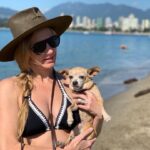 Jes Macallan Instagram - To my beautiful, courageous, little lion heart. My little “pow pow”. My Baci bean. My little Choochy. My Bacini weeny. My best friend. It has been 12 days, 2 hours, and 7 minutes since you took your last breath in my arms. My heart is completely broken and I am lost without you. The only solace and strength I hold onto was that you lived an amazing life and we had a hell of an amazing adventure together. From the moment I saw you as a teeny tiny 8 week old puppy at that flea market in the trunk of that horrible persons car in Milan, Italy... I took you from him and promised I would protect you and take care of you until your very last breath. I had no money and no plan... but I knew we could get through anything if we had each other. Who knew that you would be the one that ended up protecting me. Some EIGHTEEN YEARS later here you were, wise but weak after all of our adventures together... after all of our moves, career changes, life changes, relationship changes, heartbreaks, hardships, wins and losses, celebrations and successes and all the laughter and kisses and cuddles... you told me you were ready to cross the rainbow bridge. So we went to the beach, we went to your favorite river, we laid in the sun, you slept in my arms, and we ate cheeseburgers and turkey sandwiches till we burst. As I knew you would... you fought till the end... but your little body couldn’t keep up with your giant heart. Thank you for letting me be your person and for teaching me all of the things you did. You touched so many people and it feels as though a giant book of chapters and chapters of my life has closed. I promise to keep growing and learning and to keep the same promise for your furry brother and sister. They will be safe until their last breath. You are my hero and you were a warrior... my darling little Baci. Ci vediamo dopo amore mio. Ti amo per sempre. I love you always. #heartbroken #smilingthroughtears #furevermybestfriend #mygirl #womansbestfriend #runandplayfreeofpainontherainbowbridge #Bacibean