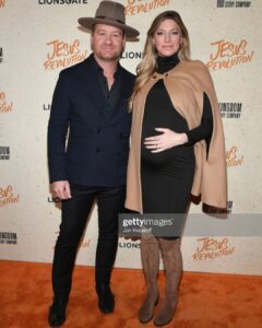 Jes Macallan Instagram - The three of us had night out celebrating all the things. We got out for date night while the teenagers held the house down. I found a quick outfit in the closet and did my hair and makeup in record time somehow with no stress, and I was the calmest I’ve ever been, standing next to the man I love, with our tiny human hangin out in my belly. I am currently feeling like a queen, and I’m overwhelmed with gratitude and awe and excitement for our continuing adventure together. I love you forever @mrnicbishop and you are amazing (as you always are) in this film. Oh yeah… make sure you go see @jesusrevolutionmovie in theaters everywhere February 24th! TCL Chinese Theatres