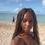 Jessica Allain Instagram - A friend gave me some good words at the beach today “Knowledge is the horse and Wisdom is the rider” Happy 2024 from my island home 🇱🇨 St. Lucia