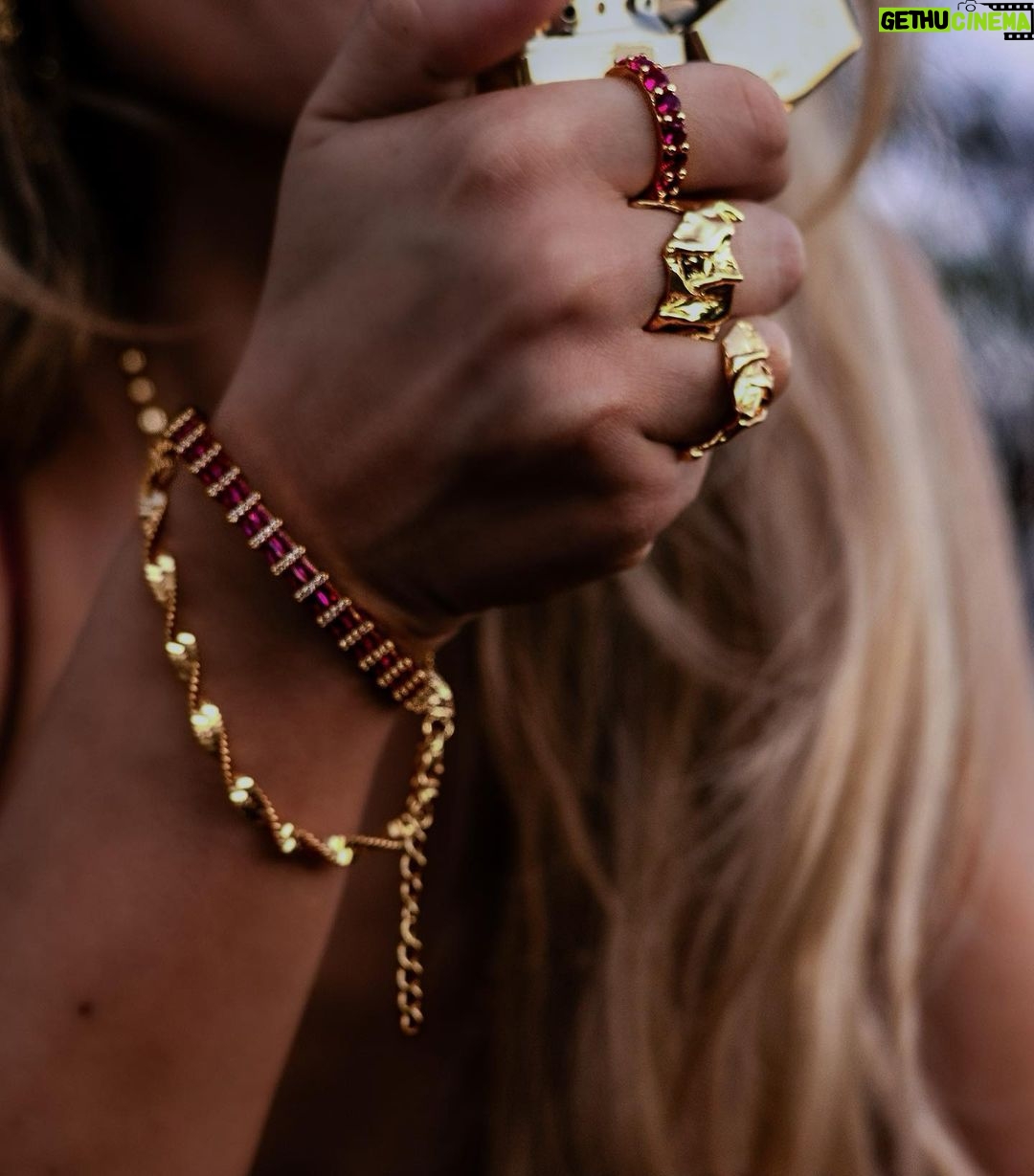 Jessica Lord Instagram - Introducing the JOCELYN. Perfect for the holidays, our cherry wine red stone bangle, with its bold hue and 18k gold plating, is a declaration of strength and passion. It’s a piece that resonates with the fire within every woman. Pair with our matching CEILIDH ring for the ultimate celebration of passion, sensuality, and the wild nature of a fiery spirit. These pieces complement each other flawlessly or serve as individual statement pieces, adding a touch of vibrant color to spice up your life. Don’t miss out on the captivating Jocelyn and Ceilidh pieces, waiting for you at Bizouxx.com 🖤