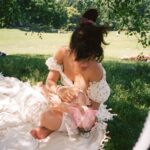 Jessica Lu Instagram - Mothering my daughter while my mother smiles at us while we are all soaking up our collective mother’s warmth on a field of soft fresh grass under the shade and protection of a large magnificent tree… Why do some take this for granted, have they forgotten their mothers? Love to all. 💚🌎🌿
