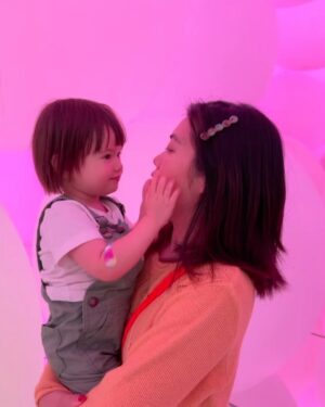 Jessica Lu Instagram - Mom, you’re missing everything. Everest is so smart, she’s talking a mile a minute. Last week she just suddenly started singing the song that we’ve been singing to her since she was a baby, she just started singing it in mandarin, and it killed me that you couldn’t hear it. When we got back from Japan, I got her in her own room downstairs finally and she’s sleeping in a full size mattress and she’ll fall out and then get back in and keep sleeping. She’s fully toilet trained. And she holds it all night til the morning even though I put her in a pull-up just in case. But mostly she’s so emotionally aware. When she cries, I ask her why she’s crying and she says she’s grumpy bc she doesn’t want daddy to leave to go to work. When I cry, she asks, are you happy, mommy? And I tell her I’m sad and she nods and says, okay mommy you sad now but later you happy okay? I read a book to her called Goodbye and now she walks around the house saying LaoLao died, LaoLao died, and I just am not ready for her to grow up this quickly because she’s 2 and also it means that time just keeps going. One day I’ll tell someone, oh forgive me, my brain, my mom just died, and they’ll ask me when, and I’ll realize it’s been years, and I’m not okay with that.