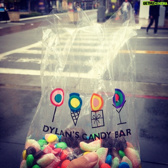 Jessica Lucas Instagram - Satisfying my sweet tooth as I walk around in the rain. @dylanscandybar The Grove