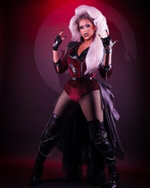Jessica Wild Instagram - I'M A ROCKSTAR!
Category is: Signature Drag
As a kid one of my favorite cartoons was Jem and the holograms. I always wanted to be a rock star and play electric guitar. My early years in drag I wore mostly black and only picked rock songs for my shows. I was part of a Rock band  called Rebeldia and I even won the Rocker chick challenge singing live on Drag Race season 2. That rocker chick jessica still lives in me. Thank you @howiebofficial for your designs and creations.QUE VIVA El ROCK!!! 🤟🤟
💄 @sapphirebeepr @angelinabeepr 
📸 Leo Santiago
👗 @howiebofficial 
💇‍♀️ @wigsbytips 
#rockerchick #rupaulsdragrace #paramountplus #allstars8 #boricua🇵🇷 #rockera