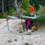 Jim Baird Instagram - (Full vid. linked in bio.) Morning at camp on Day 3 was a little more interesting than usual with something hanging out in the woods near by. After loading the canoe while our son Hudson belted out the toddler anthem Jonny Jonny, we continued our journey down the mighty Stikine River towards Alaska. We were looking to make up for lost time but heavy rain and wind slowed us down. We had to again make a sturdy tarp rig at camp to escape the downpour that evening. In the shelter of the tarp that night, my wife @torigoesoutside cooked up a the best camping meal ever which really hit the spot. Watch the full video through the link in my bio. #jbadventurer #outdoors #stikneriver #outdoors #camping #kids #familycamping