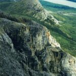 Jim Baird Instagram - I just scanned a few pics from my 2005 canoe trip down the South Nahanni River in Canada’s Northwest Territories. Trip participants included my buddy Arie @adventure_fitt_akasha and my brother @ted.baird it was a self guided trip and was super expensive for us at the time. Multiple well meaning people told me that this was a once in a lifetime trip and to do it now while I’m young. After this adventure I was deeply hooked and I just couldn’t accept that. Looking back 18 years later, I’m glad I didn’t listen to them. Stay tuned for a film I have on the go that will include some content from this early trip and others. #nahanni #adventure #canoeing #outdoors #blastfromthepast #mountains #spectacularnwt