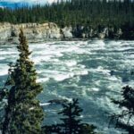 Jim Baird Instagram - Here are a few pics from my 2005 trip down the South Nahanni River in Canada’s Northwest Territories. Hard to believe it was over 18 years ago when I did this trip with @ted.baird and @arietv . Time flies but it’s not good to stress it. I would just recommend challenging yourself to make a dream you have, (or even a part of a dream) a reality in any facet as soon as possible. #nahanniriver #jbadventurer #outdoors #dreambig #followyoursreams #adventureseekers #outdoorexploration #nature #mountains #camping