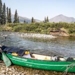 Jim Baird Instagram - New video up! (Link in bio.). This is Ep. 6 of my Hart of the Yukon series and in this one I travel through the most beautiful scenery of the trip yet. I also break out my fly road and try my had at catching Arctic Grayling on the fly. Enjoy! @travelyukon @novacraftcanoe @upnorthadventures #jbadventurer #largerthanlife #novacraftcanoe #outdoors #camping #canoeing #yukon The Yukon